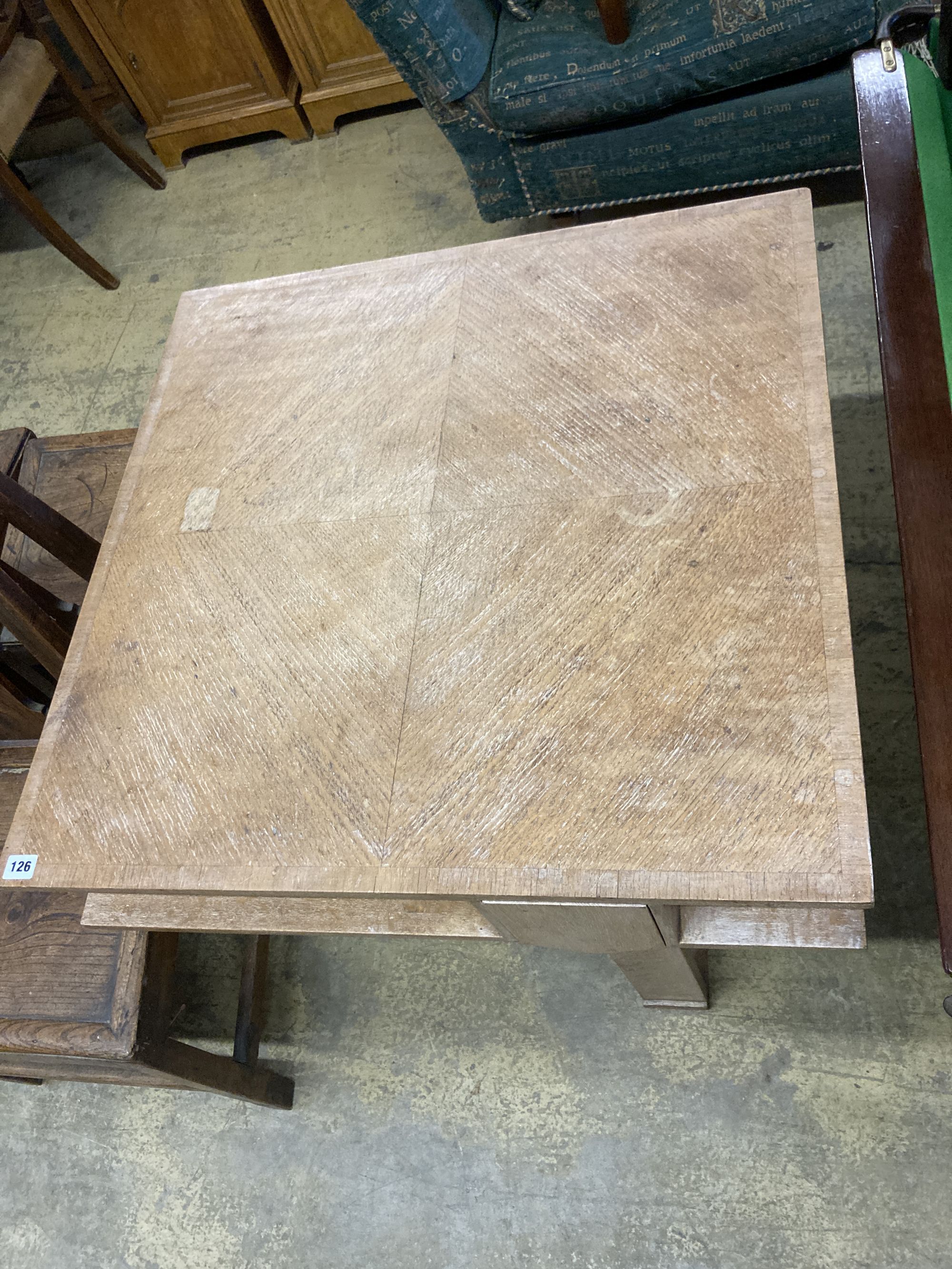 A cross banded limed oak square games table by Rowley, London, 76cm, height 75cm